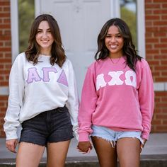 This unique & trendy Basic Greek Letter Independent Trading Co Crew Neck Sweatshirt is sure to stand out on any campus!  Grab one for you, your favorite sister, or a group of sisters (chapter discounts offered - see below for more information). Pictures Featuring:   1-7. White sweatshirt w/ Light Purple background fabric color & Light Pink top fabric color (Alpha Gamma Delta) & Pigment Pink sweatshirt w/ White background fabric color & Light Pink top fabric Color (Alpha Chi Omega)  There are 5 parts to your Greek Letter Sweatshirt: 1. T-shirt Color 2. T-shirt Size 3. Top Fabric Letter Color 4. Background Fabric Letter Color - This is the fabric behind the printed fabric. Each Greek letter sweatshirt is double stitched (two layers of fabric)  5. Greek Organization  - MAX 3 Greek letters  *p Pink Sorority Letters Sweatshirt, Preppy Crew Neck Top For College, Spring Varsity Top For Campus, Sorority Crew Neck Top For Streetwear, Spring Sorority Long Sleeve Tops, Casual Pink Sweatshirt For Game Day, Cotton Sorority Sweatshirt With Graphic Print, Cotton Sorority Sweatshirt With Long Sleeves, Sorority Long-sleeve Cotton Sweatshirt