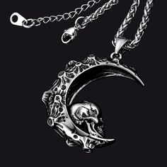 This beautifully crafted pendant necklace features an intricately detailed crescent moon with a skull resting on it. A splendid addition to any gothic or skull fan's accessories drawer!  Detail   Metal: Solid stainless steel. Stainless Steel jewelry does not tarnish and oxidize, which can last longer than other jewelry. It is able to endure a lot of wear and tear.  Width of pendant: 36mm  Length of chain: 22 inches+2 inches extending chain  Weight: 15g  Color: 316L Stainless Steel  Free gift box Gothic Mens Jewelry, Drawer Detail, Accessories Drawer, Moon Skull, Skull Pendant Necklace, Viking Symbols, Fan Accessories, Four Horsemen, A Skull