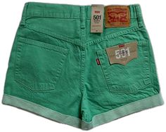 Green Denim Jean Shorts For Spring, Spring Green Denim Jean Shorts, Green Denim Shorts With Pockets, Fitted Green Jean Shorts With Pockets, Green Short Jeans For Summer, Green Denim Summer Shorts, Green Denim Shorts For Summer, Green Short Jeans With Pockets, Short Levi's Cotton Jeans