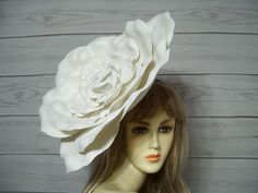 "Beautiful large white foam rose with a subtle sheen and sparkle with white feathers on a white base with a metal clip to attach to your head also included is a headband if you want to change the clip for the headband. Your choice. Just slide the clip out and slide the headband in.. You can achieve a different look if you push the petals down. This white rose is a large approx. 16\" wide rose, Lightweight and easy to wear. You can wear it on either side of your head. I also have this in a 12\" w Cream Fascinator, Alice In Wonderland Flowers, Kentucky Derby Fascinator, White Rose Flower, Derby Fascinator, Wedding Rose, Foam Roses, Fascinator Hat, White Feathers