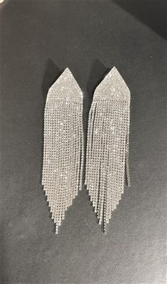 "Sparkling 6 \" Extra Long Wide Clear Tassel Rhinestone Drop Earrings, Silver ,  Weddings , Statement Earrings  DAZZLING AND SPARKLY !!     6 \" Long x almost 1 1/2\" Wide \" ! Beautiful and Stunning Earrings    Please ask any questions as I do not accept returns! Thank You" Silver Weddings, Drop Earrings Silver, Earrings Chandelier, Earring Silver, Stunning Earrings, Earrings Silver, Chandelier Earrings, Extra Long, Statement Pieces