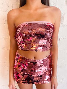 FINAL SALE This dazzling sequin tube top will make you shine bright like a diamond, perfect for a night out or a special occasion. 95% Polyester 5% Spandex Hand Wash Cold Line Dry Pull Over Back Zipper Meet Bella! Height: 5’7” Bust: 34” Waist: 26” Hips: 36” Wearing Size: Small