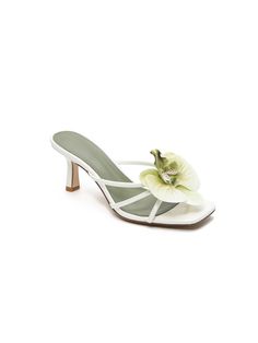 Helene Floral Heels in Green Helene is a graceful fusion of elegance and charm, crafted to elevate your style effortlessly. These heels feature delicate floral embellishments that bring a touch of nature-inspired beauty to your ensemble. The soft white color, combined with the intricate strappy design, exudes sophistication and refinement. Perfect for weddings, garden parties, or any event where you want to make a lasting impression, the Helene Floral Heels are a beautiful addition to any wardrobe. Details: - Delicate floral embellishment- Strappy design- Mid-height heel (7cm)- Square toe- Soft white color- Good Girl Things Elegant Days Collection Elegant Low Heel Spring Heels, Elegant Low Heel Heels For Spring, Elegant Round Toe Heels For Spring, Chic Spring Wedding Shoes With Padded Heel, Chic Spring Wedding Shoes With Sculpted Heel, Elegant High Heel Spring Heels, Chic Wedding Shoes With Sculpted Heel For Spring, Elegant Spring Wedding Shoes With Block Heel, Elegant Flower Heels For Wedding