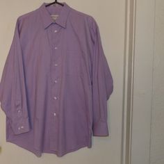 Color Light Lavender, Button Down , Long Sleeves Feature One Wrist And One Button Cuff With Two Buttons For Placement, One Open Breast Pocket , Material Is Cotton , Condition Is New Without The Tags And Never Worn Or Washed No Issues To Note , Size 17 Neck Measurements Are Roughly 32" From Shoulder To Hem And About 25" Pit To Pit With A Sleeve Length Of About 23" , Pet Friendly Non Smoking Home. Collared Purple Shirt For Spring, Spring Collared Purple Shirt, Purple Collared Shirt For Spring, Spring Purple Collared Shirt, Fitted Purple Top For Semi-formal Occasions, Purple Fitted Top For Semi-formal Occasions, Classic Purple Cotton Dress Shirt, Purple Button-up Daywear Shirt, Purple Cotton Business Shirt