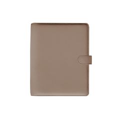 a brown leather notebook on a white background