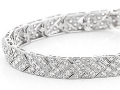 Bella Luce ® white diamond simulant 8.85ctw round, rhodium over sterling silver tennis bracelet. Measures approximately 7.25" or 8"L x 0.31"W and has a hidden box closure. The diamond equivalent weight is 4.56ctw. Classic White Bracelet With Pave Setting, White Classic Bracelet With Pave Setting, Classic White Tennis Bracelet With Pave Setting, Anniversary Tennis Bracelet With Pave Setting In Platinum, Anniversary Platinum Tennis Bracelet With Pave Setting, Platinum Tennis Bracelet With Pave Setting, Fine Jewelry Diamond White Tennis Bracelet With Pave Setting, Fine Jewelry Tennis Bracelet With Pave Setting, White Fine Jewelry Tennis Bracelet With Pave Setting