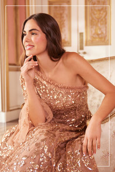 Gold Off-shoulder Evening Dress For Gala, Gold Off-shoulder Gown For Wedding, Gold Off-shoulder Wedding Dress, Glamorous Gold Off-shoulder Evening Dress, Sequin Evening Dress For Prom Season, Festive One Shoulder Gala Gown, One-shoulder Festive Gown For Gala, One-shoulder Gown For Gala And Festive Occasions, Glamorous Off-shoulder Sequin Gown