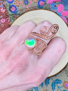 Artfully woven in beautiful bare copper, this pretty pastel aurora (lab) opal ring is adjustable from ~ sizes 6-10. Megan White, Fantasy Pendant, Aquamarine Pendant, Wire Weaving, Wire Wrapped Rings, Pretty Pastel, Wrap Rings, Opal Ring, Opal Rings