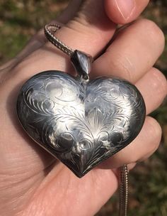 We are utterly charmed by this Vintage Sterling Silver Engraved Heart pendant. It has presence, elegance, and such lovely energy. What more dear present than a talisman that says "You have my heart" - and given the upcoming Mother's Day holiday, "Thank you for taking such tender care of mine." Rare for its' size and width, made in the 1980s. Chain not included in the listing, but included in the photographs so that you see the pendant closer to how it will look when a chain is added later to be