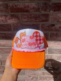 Cozy Crowns is a fully customizable trucker hat bar! From Every day, game day, sporting events, parties, vacation hats and more! You will be able to create your own custom cozy crown from a variety of patches, chains, vinyl, etc! We can't wait to see what you create! XOXO, Cozy Crowns Trucker Hat Wall Display, Trucker Hat Bar Vendor Set Up, Playful Adjustable Orange Hat, Funky Snapback Trucker Hat For Festival, Fun Orange Adjustable Hat, Customizable Fun Style Trucker Hat Snapback, Customizable Fun Style Snapback Trucker Hat, Customizable Fun Snapback Trucker Hat, Orange Trucker Baseball Cap One Size