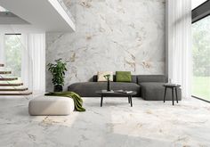 a living room with marble walls and flooring