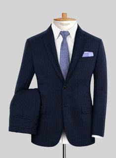 As a general rule, blue suits always look good, but when dressed in fine pinstripes, they look sensational, just like our Scabal Sapphire Pinstripe Blue Wool Suit. Crafted from pure wool fabric with natural stretch, it boasts a rich blue hue and is finished with ultra-fine pinstripes, giving you a good-looking suit season after season. This suit is the perfect choice for the demands of the corporate nine-to-five or for wherever the hours of five-to-nine take you.  Look Includes    Scabal     Sap Elegant Tailored Pinstripe Sets, Elegant Striped Formal Sets, Elegant Tailored Striped Suits, Striped Suits For Formal Occasions, Elegant Striped Suits For Business Casual, Striped Suits In Suiting Fabric For Formal Occasions, Striped Semi-formal Suit, Elegant Striped Suit With Notch Lapel, Formal Pinstripe Notch Lapel Sets