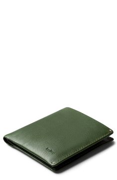 A well-organized interior ensures superior easy and convenience with this RFID-protected wallet. It has a smart pull-tab compartment so you don't have to dig for things, and its made from premium calfskin for lasting appeal. Interior currency pouch; pull-tab slip pocket; three card slots Leather Imported Green Classic Wallet With Rfid Blocking, Green Leather Card Holder With Rfid Blocking, Classic Green Wallet With Rfid Blocking, Green Leather Rfid Blocking Card Holder, Green Rfid Blocking Wallets For Business, Green Rfid Blocking Wallet For Business, Green Leather Business Wallets, Green Rectangular Business Wallet, Green Bifold Wallet For Everyday Use