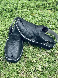 "Widely recognized as the Peshawari Chappal, these sandals hold a special place in the cultural heritage of Khyber Pakhtunkhwa province, Pakistan. Meticulously crafted with a focus on a lightweight in-seamed sole and supple leather, our Peshawari chappals are renowned for their durability, comfort, and versatility. Embraced not only in Pakistan but also across borders in India, Europe, the United Kingdom, and the USA, the Peshawari Chappal has transcended its regional roots to become a global sy Leather Sandals With Dabka And Round Toe, Traditional Huarache Sandals With Rubber Sole, Traditional Open Toe Huarache Sandals, Festival Sandals With Leather Sole And Single Toe Strap, Traditional Handmade Closed Toe Huaraches, Traditional Open Toe Leather Shoes With Leather Sole, Traditional Closed Toe Toe Ring Sandals For Festivals, Traditional Leather Toe Ring Sandals With Single Strap, Traditional Closed Toe Toe Ring Sandals With Leather Sole