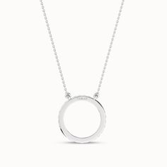 The Circular Silhouette Necklace is a testament to timeless style. It has a diamond-studded circular pendant that captures the essence of enduring love. This piece transforms any ensemble into a captivating look. It’s more than just a necklace; it’s a circle of endless possibilities. Everyday Luxury White Gold Solitaire Necklace, Sterling Silver Diamond Pendant Necklace With Halo, Timeless Sterling Silver Necklace With Single Cut Diamonds, Refined Sterling Silver Necklace With Diamond Cut, Refined Sterling Silver Diamond Cut Necklace, Timeless White Gold Necklace With Round Cut, Modern Round Diamond Necklace With Adjustable Chain, Sterling Silver Circle Necklace Fine Jewelry, Minimalist Round Diamond Necklace For Formal Occasions