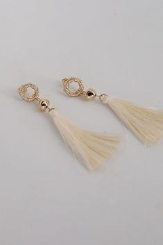 The Gracelyn Gold Tassel Earrings are the hit of the party! These trendy earrings start with a stud post back and have a tassel detail. Add these fun earrings to a black dress + heels to add a chic touch to your date night look! Gold Plated Tassels Stud Post Back One Size | Length 3” Chic Dangle Tassel Earrings For Party, Chic Tassel Drop Earrings For Party, Elegant Tassel Drop Earrings For Summer, Chic Tassel Earrings For Evening, Chic Summer Jewelry With Tassels, Elegant Summer Tassel Drop Earrings, Elegant Party Earrings For Summer, Glamorous Party Earrings For Spring, Glamorous Spring Party Earrings