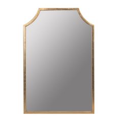 a gold framed mirror on a white wall