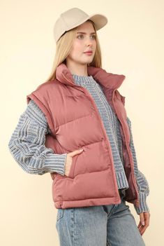 Introducing the Valerie Zip Up Puffer Vest - the perfect combination of comfort and style. Available in 3 chic colors, this soft and cozy puffer vest features a convenient zip front and side pockets. Get ready to rock that "soccer mom chic" look! Available in 3 colors: Black, Beige and Blush Soft and Cozy puffer style Zip front Side pockets Fits true to size Available in sizes S-L Carrie is a 6 wearing size Small Ships FAST and FREE with all orders over $65! Puffer Style, Soccer Mom, Long Crop Top, Plus Size Shopping, Sweater Sale, Romper Dress, Outerwear Sweater, Puffer Vest, Sweater Blouse