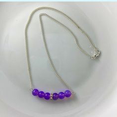 "🌸 Sign up for the Starfish by Kristan email list and get 15% off your order NOW! https://mailchi.mp/13833f6189a3/new-customers 🌸 Looking for high quality, affordable jewelry?  If so, this necklace is for you!  Beautiful silver bar necklace, wire wrapped with tarnish free silver wire with amethyst glass beads.  Each bead in this necklace is hand selected and wire wrapped with high quality tarnish free silver wire and linked to tarnish free silver cable link chain to ensure the best quality.  Necklace has a lobster claw closure.    Hypoallergenic.   OUR JEWELRY IS... *Made with high quality lava stones, semi-precious beads, silver, and glass beads *Tarnish free silver wire & gold wire, 925 silver, 1mm stretch cord, waxed linen cord *Crafted in house *Available in sizes 16\" and 18\" CARE Lavender Beaded Chain Jewelry For Gifts, Purple Polished Beads Crystal Necklace As Gift, Purple Necklace With Spacer Beads As Gift, Purple Necklaces With Spacer Beads For Gift, Purple Necklace With Spacer Beads For Gift, Purple Polished Beads Necklace As Gift, Purple Polished Beads Necklace For Gift, Spiritual Purple Necklace With Beaded Chain, Purple Beaded Necklaces With 8mm Beads For Gifts