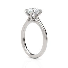 A beautiful Engagement ring in gold or platinum that includes a Colorless Round Moissanite set into the 4 prongs tulip setting. This solitaire ring is designed to allow the wedding band to sit close and flush with the engagement ring because the center stone sits directly above the band. Most of my items are made to order and will ship within 14-21 business days after the payment has been processed. If there are any delays I will contact you immediately. If you have a rush order contact me and I Brilliant Cut Diamond Ring For Marriage, Moissanite Diamond Ring For Marriage, Round Cut, 14k White Gold Wedding Jewelry With Tension Setting, Classic Solitaire Halo Round Cut Ring, Diamond Ring With Prong Setting For Wedding, Classic Cut Diamond Promise Ring, Vvs Clarity Round Cut Diamond Ring For Marriage, Classic Cut Diamond Jewelry For Promise, Silver Solitaire Diamond Ring In 14k White Gold