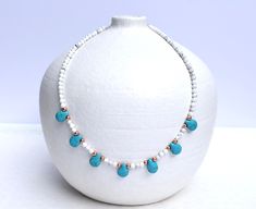 This lovely beaded necklace consists of mini natural howlite stones (white) that have been embellished with turquoise howlite teardrop beads, and rose gold accents. So pretty, so feminine, and can also come with silver or gold accents if preferred.  MATERIALS: ▪️ Natural Howlite 4mm beads ▪️ Howlite (blue) teardrop beads ▪️ Accents - choice between gold plated, rose gold plated, or silver plated beading DIMENSION: Necklace Length - 45cm *Please contact me if you require a different length Beaded Howlite Necklaces With Round Beads, White Turquoise Gemstone Beads Necklace For Gifts, White Turquoise Necklace With Gemstone Beads For Gifts, White Turquoise Necklace With Gemstone Beads As Gift, Howlite Gemstone Beads Necklace, White Natural Stone Necklace For Gift, Howlite Beaded Necklaces With Round Beads For Gifts, Howlite Beaded Necklaces With Round Beads As Gift, Howlite Round Beaded Necklaces As Gift