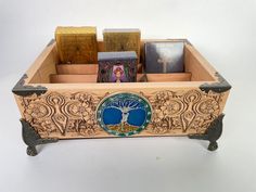 a wooden box filled with lots of different types of items on top of each other