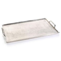 a large metal tray with handles on it