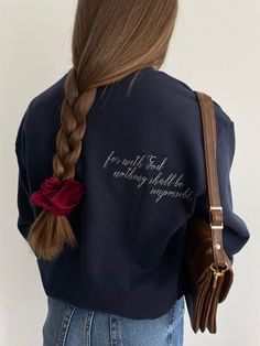 This is a professionally embroidered sweatshirt. 👚MATERIAL  80% cotton 20% polyester ▪️ SIZE  Sizes are unisex. Please check the size chart before you purchase.  💧 CARE:  Machine wash cold, inside-out, gentle cycle with mild detergent and similar colors.   Tumble dry low, or air-dry for longest life. Every item is made to order, creating less fabric waste than conventional manufacturing. Please note that the embroidery comes with a backing that acts as a stabilizer to support the fabric and st Navy Long Sleeve Sweatshirt With Embroidered Logo, Fleece Sweatshirt With Embroidered Text For Streetwear, Fall Fleece Sweater With Embroidered Text, Streetwear Fleece Sweatshirt With Embroidered Text, Fall Embroidered Text Fleece Sweater, Navy Cotton Sweatshirt With Embroidered Logo, Fall Fleece Sweatshirt With Embroidered Text, College Sweatshirt With Embroidered Text And Relaxed Fit, Relaxed Fit College Sweatshirt With Embroidered Text