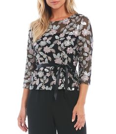 From Alex Evenings Petite&#x2C; this blouse features:Stretch sequin fabrication round illusion neckline3/4 sleevesEmbroidered details BeltedLinedCenter back zip closureApprox. 20.5" lengthPolyesterHand wash cold/flat dry Imported.