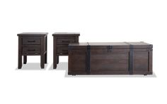 three pieces of furniture including a trunk and end table, all in dark brown wood