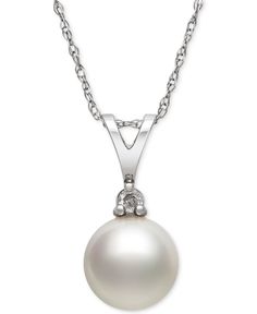 Timeless style. This classic, 14k white gold pendant features a cultured akoya pearl (7mm) topped with a glistening diamond accent. Approximate length: 18 inches. Approximate drop: 1/2 inch. Elegant Formal Necklace With Polished Finish, Classic Pearl Necklace With Diamond Accents, Elegant White Gold Necklace With Polished Finish, Elegant White Gold Necklaces With Polished Finish, Akoya Pearl Necklace With Brilliant Cut, Brilliant Cut Akoya Pearl Round Necklace, Brilliant Cut Akoya Pearl Necklace, Elegant White Necklace With Polished Finish, Timeless White Jewelry With Diamond Accents