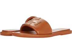 Tory Burch Double T Sport Slide - Women's Shoes : Aged Camello/Gold : Slip right into style and comfort with Tory Burch Double T Sport Slides! Upper, lining, and insole made of leather material. Slip-on construction. Iconic Tory Burch double T logo on vamp. Open snip-toe silhouette. Man-made outsole. Imported. Measurements: Weight: 7 oz Product measurements were taken using size 9, width M. Please note that measurements may vary by size. Weight of footwear is based on a single item, not a pair. Classic Tan Sandals With Leather Lining, Classic Tan Sandals With Leather Sole, Classic Tan Slip-on Sandals, Classic Tan Leather Sandals, Tan Leather Slip-on Sandals, Casual Tan Sandals With Leather Sole, Casual Tan Sandals With Leather Lining, Tan Leather Casual Sandals, T Logo