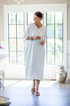 Indulge in luxury with the Comfy Kenzie Kaftan! This kaftan offers ultimate comfort and style. Perfect for all occasions, formal or informal, or even just lounging. With convenient pockets, it's perfect for going out or cozy nights in. Made from a soft wool blend that is 70% Merino wool and 30% acrylic. Click Here for Care Instructions Elegant Oversized V-neck Maxi Dress, Elegant V-neck Kaftan For Vacation, Elegant Spring Maxi Dress For Loungewear, Chic Tunic Maxi Dress For Loungewear, Elegant Summer Loungewear Maxi Dress, Elegant Summer Maxi Dress For Loungewear, Elegant Tunic-style Kaftan, Elegant Relaxed Fit Maxi Dress For Vacation, Elegant Spring Kaftan With Relaxed Fit