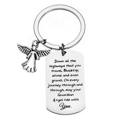 a keychain with an angel on it that says, down all the highways that you travel, blacktop, stone and even gravel