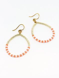 "Coral gold hoop earrings. beaded earrings. beaded hoops. handmade jewelry. jewelry gifts for women. gift for teenager. seed bead earrings. Handmade in Portland, Oregon.  This will make the perfect gift! Or, definitely get it for yourself, I support that, too. MEASUREMENTS + MATERIALS - Length is about 1.5 inches in length - Color is a coral orange with white and gold accent seed beads - Gold plated for sensitive skin (hypoallergenic) - Other colors available!  WHAT PEOPLE SAY \"Beautiful crafts Gold Beaded Small Hoop Earrings For Summer, Summer Tiny Beads Small Hoop Earrings, Gold Hoop Earrings With Tiny Beads For Summer, Summer Tiny Beaded Small Hoop Earrings, Gold Beaded Hoop Earrings For The Beach, Summer Gold Beaded Nickel-free Earrings, Gold Hoop Earrings With Colorful Beads For Beach, Gold Beaded Nickel-free Earrings For Summer, Gold Teardrop Hoop Earrings For Summer