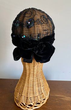 "1920s Flapper skull cap was worn for evening parties, created to complement the newer bobbed hairstyles of the 1920s. Condition is good, wearable, the net foundation is perfectly intact, but there are some missing sequins. The narrow brim of the hat is black velvet and it ends in the back With a velvet bow. So attractive. It still retains its original cloth tag on the inside rim. The tag says Suzanne Talbot, Paris. The tag also says \"reproduction\" but the materials and construction say 1920s." Vintage Fitted Costume Hats And Headpieces For Carnival, Vintage Fitted Costume Hats For Carnival, Vintage Fitted Headpieces For Party, Vintage Adjustable Costume Hats For Party, Fitted Vintage Headpiece For Carnival, Party Costume Cap One Size, Vintage Cloche Costume Hat For Party, Fitted Vintage Costume Hats And Headpieces For Party, Vintage Cloche Party Hat