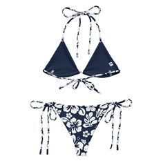 Indulge in the luxurious and exclusive style of our White Hawaiian Flowers on Navy Blue String Bikini. This beautiful string bikini set is not only comfortable, but it also offers double-layering and UPF 50+ protection. Customize the straps to your liking and get ready to turn heads at the beach! Made from soft recycled polyester, this bikini is both stylish and sustainable. • Soft and stretchy material with UPF 50+• Sizes up to 6XL• Bikini top comes with removable padding for comfort• Multiple Adjustable String Swimwear For Pool, Beach String Swimwear With Adjustable Straps, Beach Swimwear With Adjustable String Straps, Beach Swimwear With Adjustable Straps, Beach Swimwear With Adjustable Straps And String Shape, Blue String Swimwear For Swimming, Blue String Beachwear Swimwear, Blue String Swimwear For Beach, Blue String Swimwear For Beachwear