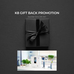 a black box with a bow on it and the words k8 gift back promotion