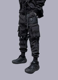 tactical techwear pants Urban Cargo Pants With Functional Pockets For Streetwear, Functional Streetwear Cargo Pants With Multiple Pockets, Tactical Bottoms With Multiple Pockets For Streetwear, Black Techwear Pants For Outdoor Activities, Black Techwear Parachute Pants For Outdoor Activities, Techwear Parachute Pants With Functional Pockets For Outdoor Activities, Functional Cargo Pants For Streetwear With Belt Loops, Functional Cargo Pants With Multiple Pockets For Streetwear, Black Combat Parachute Pants With Functional Pockets