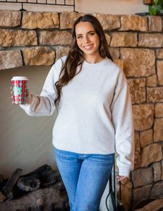 Made with the softest materials, this sweatshirt is designed to keep you warm and comfortable all season long. Whether you are lounging at home or running errands, this sweatshirt will be your go-to choice. Sizing: Small 4-6 Medium 8-10 Large 12-14 XL 14-16 Cozy Super Soft Everyday Sweatshirt, Soft Fleece Sweatshirt With Cozy Fit, Cozy Fleece Sweatshirt With Soft Texture, Cozy Fit Fleece Sweatshirt With Soft Texture, Heather Grey Fleece Sweater With Ribbed Cuffs, Cozy Fit Heather Grey Sweatshirt With Ribbed Cuffs, Relaxed Fit Fleece Sweatshirt, Super Soft, Winter Sweats With Relaxed Fit And Super Soft Texture, Winter Sweats Relaxed Fit Super Soft