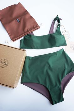 Reversible bikini set, M size in green +taupe color, 6 in 1 design- color combinations to wear it. "Riviera" set it is top with soft cups and elegant high waisted bikini. Eco Sun Day all swimwear made from sustainable fabric which is made from recycled ocean plastic and fishing nets. Composition- 78% Recycled PA + 22% EA. Ethycally made in Lithuania Ready to ship, sending same day! In case You would like to oder this set in other size or color , chek this made to oder item: https://www.etsy.com/ Reversible Swimsuit, Sun Day, Fishing Nets, Sustainable Fabric, Sustainable Swimwear, Reversible Bikinis, Taupe Color, Sustainable Fabrics, Design Color