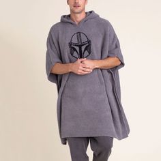 100% Polyester Microfiber Color: Graphite Size: One Size Envelop yourself in the cozy warmth of this roomy poncho for women and men, inspired by The Mandalorian! Crafted from Barefoot Dreams' signature CozyChic knit, this style's the perfect piece to snuggle up with while watching all your favorite Star Wars™ momentsThe slouchy hood and generous front pocket keep you warm wherever you may be: home, sporting events, or planet Hoth. Care: Machine wash cold. Gentle cycle. Do not bleach. Tumble dry Poncho For Women, The Mandalorian, Disney Dream, Sport Event, Front Pocket, Star Wars, Lounge Wear, Athletic Jacket