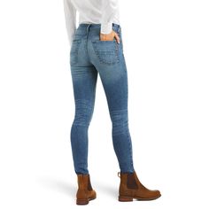 Every woman deserves that perfect pair of jeans. Trend right high-rise and a clean, skinny silhouette combine with luxurious premium Italian denim to give you a look that works anywhere. Slim through thigh 10” high rise Skinny leg opening 10.5 oz premium Italian denim Medium wash with subtle hand sanding 92% cotton, 6% elasterell-p, 2% spandex Machine wash cold | Women's Premium High Rise Skinny Jeans Stretch in Cameroon Cotton, size 26 by Ariat Fitted High Rise Winter Jeans, Fitted Medium Wash Bottoms For Winter, Fitted Mid-rise Winter Jeans, Jeans Trend, All Colors, Stretch Jeans, Every Woman, Levi Jeans, Perfect Pair