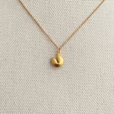 Fortune Cookie, Chinese New Year, Lucky Necklace, Good Luck Necklace Gift for Women, Fortune Cookie Pendant Charm Necklace, Gold or Silver  Item details ✰ Color: gold, silver ✰ Finish:  14K gold plated pendant ✰ Shimmering high quality 15-19" chain length ✰ High quality clasp to finish  ✰ Comes in a cute gift box, perfect for gift-giving! Cheap Good Luck Charms Necklace, Lucky Necklace, Luck Necklace, Good Luck Necklace, Cute Gift Boxes, Fortune Cookie, Nouvel An, Star Necklace, Necklace Gift