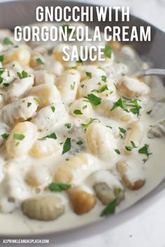 gnocchini with gorgonzoloa cream sauce in a skillet