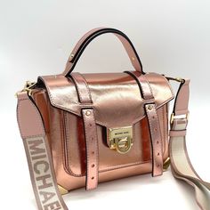 Brand New With Tag Michael Kors Manhattan Crossbody Satchel Bag 100% Authentic Color: Primrose Gold-Tone Hardware 10"W X 7.25"H X 4"D Adjustable Strap: 19"-21" Exterior Details: Front Slip Pocket Interior Details: Back Zip Pocket, Front Slip Pocket Flip-Lock Fastening Luxury Pink Satchel With Detachable Strap, Luxury Pink Bag With Metal Hardware, Luxury Pink Bags With Metal Hardware, Pink Leather Bag With Metal Hardware, Modern Pink Shoulder Bag With Metal Hardware, Michael Kors Blush Bag With Detachable Strap, Rectangular Pink Satchel With Branded Hardware, Pink Rectangular Satchel With Branded Hardware, Pink Crossbody Bag With Metal Hardware