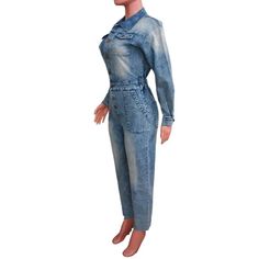 The Pocketed Button Down Denim Jumpsuit is a wardrobe essential! It's perfect for any occasion, with plenty of pockets and a stylish denim finish. Upgrade your style with this comfortable yet fashionable one-piece! Decoration Button , Pockets Length Ankle-Length Style Casual Fabric Type Denim Material Cotton , Spandex Neckline Turn-down Collar Pattern Type Solid Sleeve Length Full Season Winter , Spring / Autumn Fabric Slight Stretch Light Wash Button-up Denim Jumpsuit, High Rise Denim Blue Utility Jumpsuit, High-waisted Denim Utility Jumpsuit Or Romper, High Waist Denim Jacket With Pockets, High-waist Denim Utility Jumpsuit, Utility Denim Button-up Jumpsuit, Utility Style Denim Jumpsuit With Buttons, Utility Denim Jumpsuit With Buttons In Medium Wash, Utility High-rise Denim Jumpsuits And Rompers