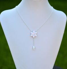 "2018 Collection, MORNING HEIRLOOM Y NECKLACE COLLECTION Featuring hand sculpted white Gardenia and tear drop pearl necklace. Details : - Gardenia made from baking polymer clay. -Flower size approx : 22-23mm - Flower glued on metal plated over brass filigree. - Entire length ; 16 inches + 2 \" extender. Finish with lobster clasp. - Chain finish available in silver plated, antiqued brass, gold and rose gold. - Sterling silver and gold filled chain available with additional cost, ( the filigree in Pearl White Flower Shaped Jewelry With Pearl Drop, White Dangle Drop Necklace With Adjustable Chain, Elegant White Flower Necklace With Adjustable Chain, White Flower Pendant Jewelry With Adjustable Chain, Delicate White Adjustable Drop Necklace, Delicate Adjustable White Drop Necklace, Flower Shaped Pearl Pendant Necklace For Gift, White Jewelry With Flower Charm And Shape, White Drop Necklace With Adjustable Chain