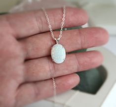 "Beautiful Large white lab-created opal pendant necklace. These gorgeous opals are very similar to natural mined opals. Lab-created opals contain 70-90% silica (from which natural opal is formed) and 10-30% resin. The resin makes the opal harder, stronger, unlike natural opals, which are known to be soft and fragile. Each opal displays a rainbow of color that sparkles with every catch of light. I've handset two different size opals in a solid sterling silver prong settings 16x12mm (5/8\" x 1/2\" White Opal Birthstone Jewelry, White Opal Jewelry Gift, Round Pink Opal Jewelry For Gifts, Ethiopian Opal Oval Pendant Jewelry Gift, Pink Opal Jewelry For Gifts, Ethiopian Opal Birthstone Jewelry As Gift, Pink Opal Gemstone Jewelry Gift, Pink Opal Gemstone Jewelry For Gift, White Opal Necklace With Natural Stones