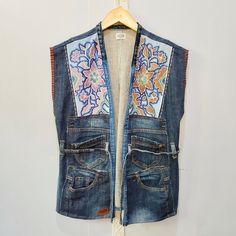 "This stunning patchwork vest is one of a kind piece designed for the ecofriendly fashion On the front of the chest, I used hand drawn batik technique for the light blue denim. The color of the batik on the left and right is different. This makes it even more unique On the edge of the arm, I use lurik.  Lurik is a traditional Indonesian woven fabric  There's a little belt you can use to streamline. Or you can just leave it wide by tying a little blue string inside I dont make more than one item I offer special, unique items Only one is available for one special person Measurements Bust 41\"/104cm Lenght 28\"/70cm Size L I ship from Indonesia worldwide Thank you for checking in and let me know if you have any question! Cheers RuZe Style" Fancy Kimono, Upcycling Clothing, Batik Technique, Patchwork Vest, Bohemian Mode, Recycled Jeans, Altered Couture, Mode Boho, Upcycle Jeans